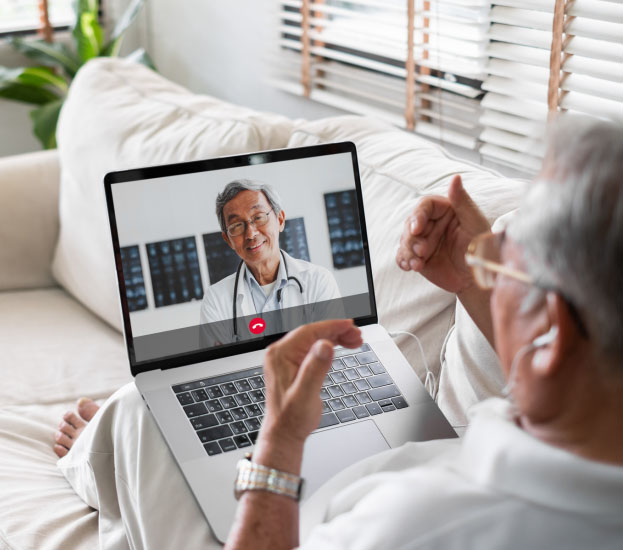 An elder man receiving a virtual care online